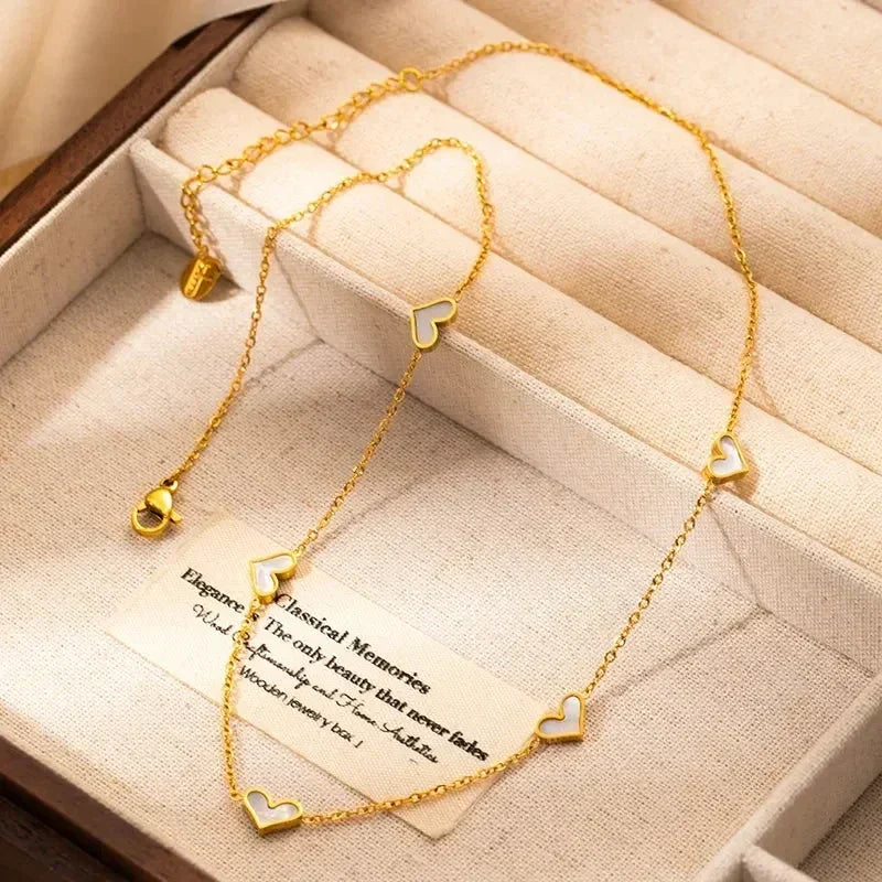 Parure de bijoux en acier inoxydable 316L ANENJERY avec collier, bracelet et boucles d'oreilles en forme de cœur et coquille pour femmes et filles, style simple et tendance, cadeaux en gros