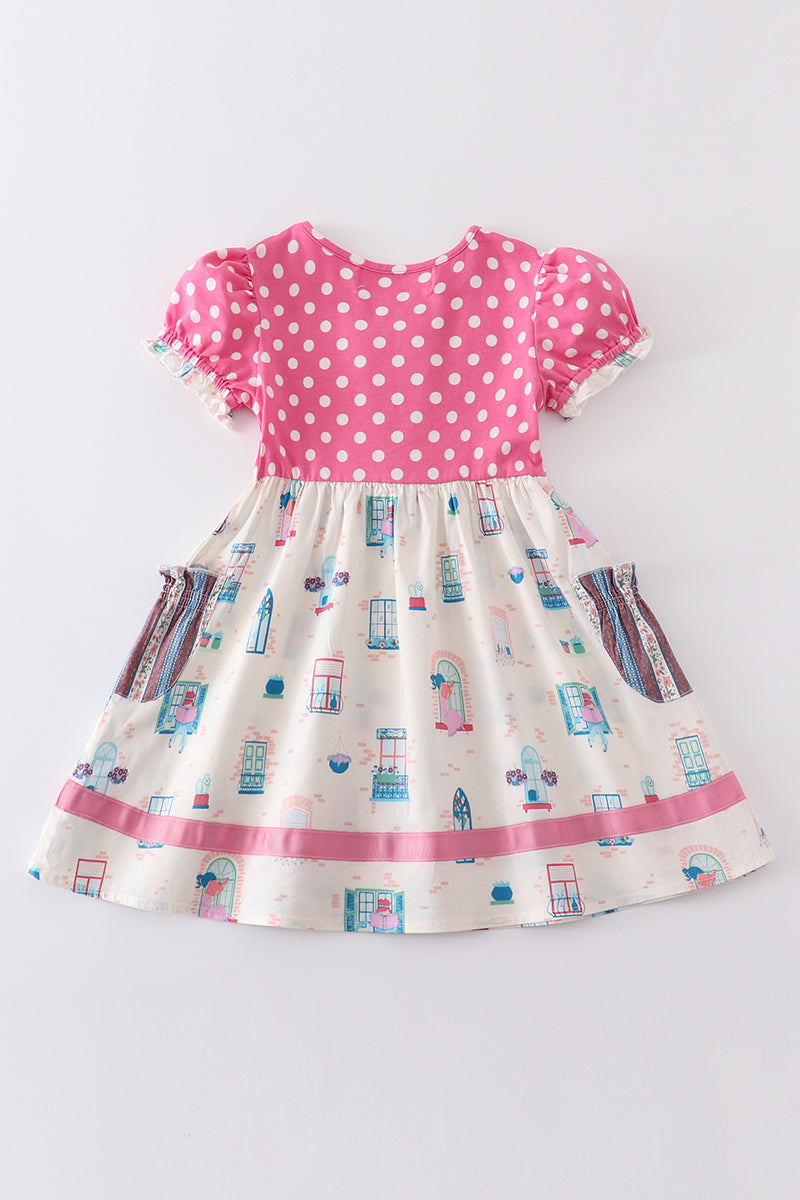Robe à pois roses balcon platine