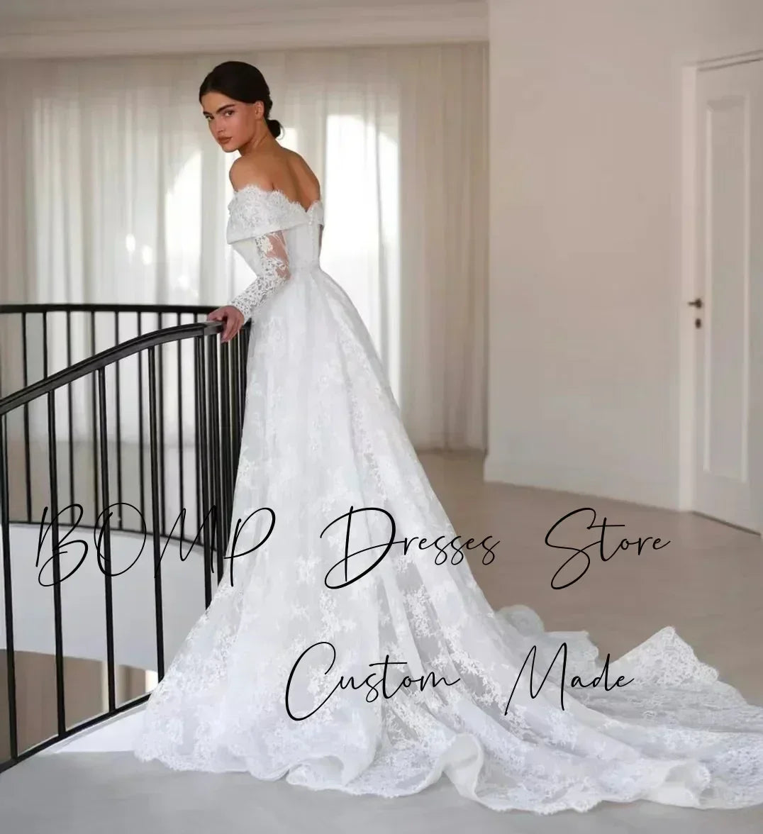 BOMP Robe de mariée élégante en dentelle Cœur Épaules dénudées Manches longues Traîne Ivoire Robe de mariée personnalisée Robe De Mariée