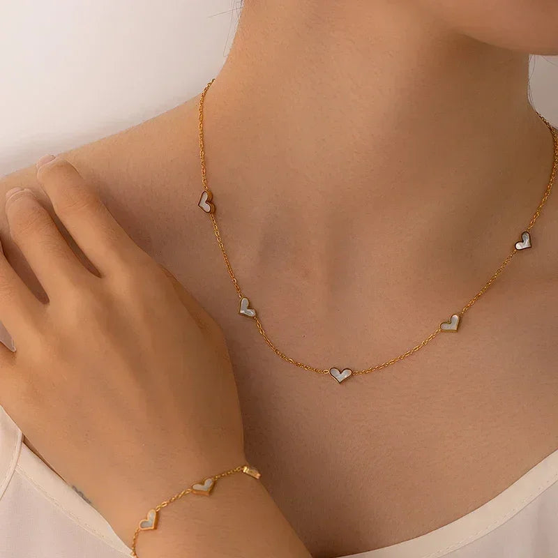 Parure de bijoux en acier inoxydable 316L ANENJERY avec collier, bracelet et boucles d'oreilles en forme de cœur et coquille pour femmes et filles, style simple et tendance, cadeaux en gros