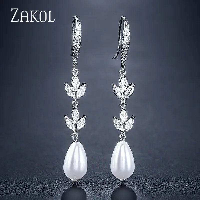 ZAKOL Boucles d'oreilles pendantes rondes imitation perles pour femmes, brillantes, en zircone et cristal, feuilles longues, bijoux de mariée pour mariage