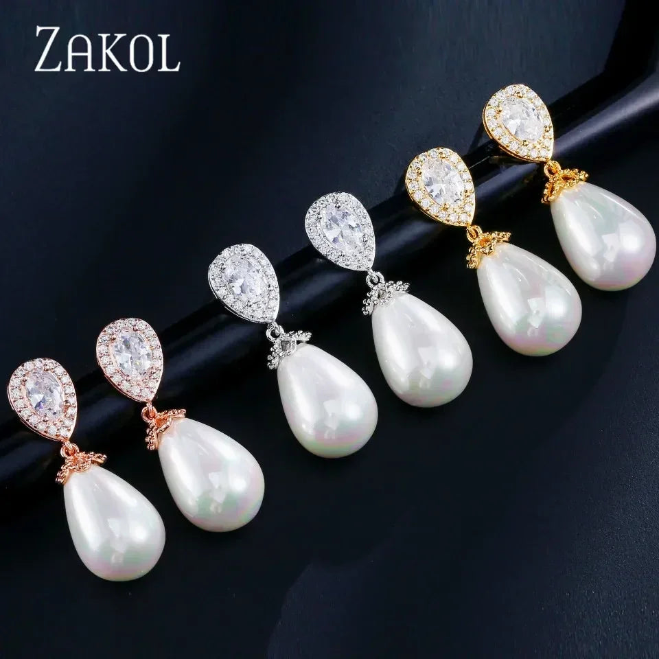 ZAKOL Élégantes Boucles d'Oreilles Pendantes Goutte d'Eau en Perles d'Imitation et Oxyde de Zirconium pour Femme, Bijoux de Mariage