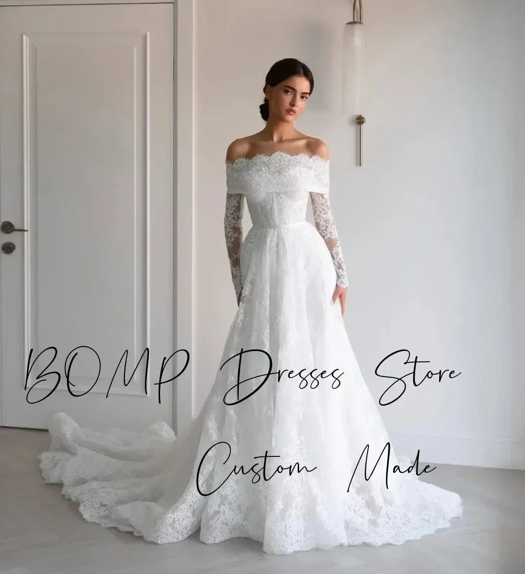 BOMP Robe de mariée élégante en dentelle Cœur Épaules dénudées Manches longues Traîne Ivoire Robe de mariée personnalisée Robe De Mariée