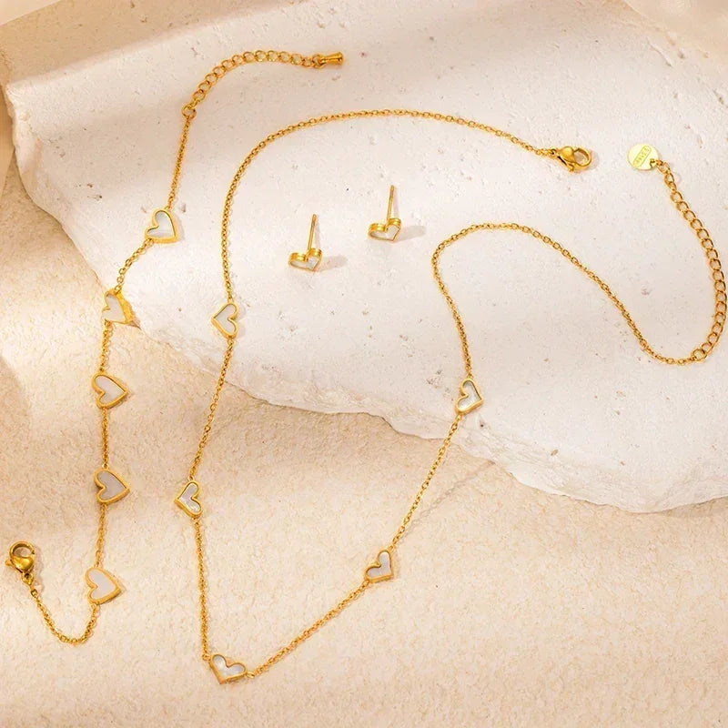Parure de bijoux en acier inoxydable 316L ANENJERY avec collier, bracelet et boucles d'oreilles en forme de cœur et coquille pour femmes et filles, style simple et tendance, cadeaux en gros