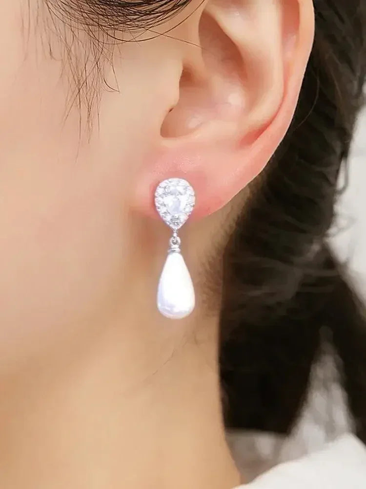 ZAKOL Élégantes Boucles d'Oreilles Pendantes Goutte d'Eau en Perles d'Imitation et Oxyde de Zirconium pour Femme, Bijoux de Mariage