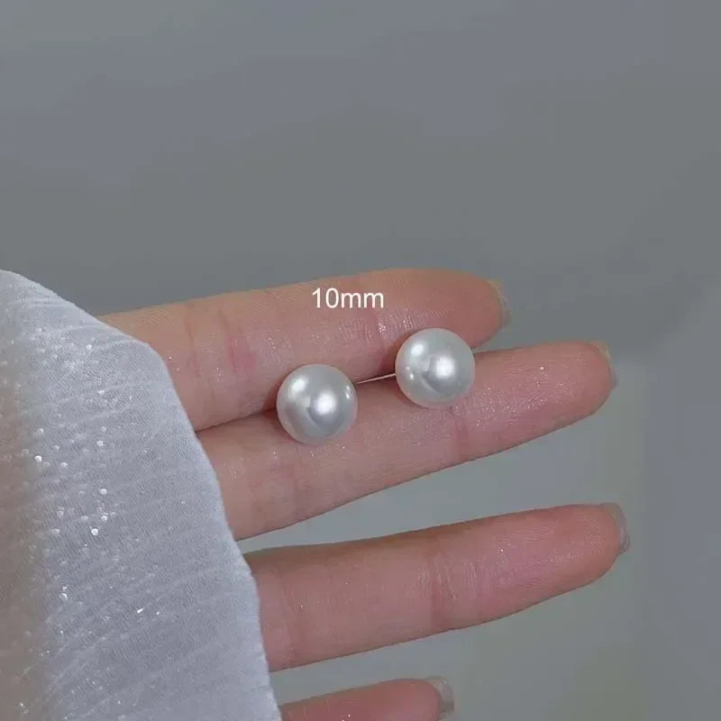 Boucles d'oreilles clous coréennes élégantes en perles blanches brillantes pour femmes, simples et exquises, imitation perles rondes, bijoux de mariage et de fête