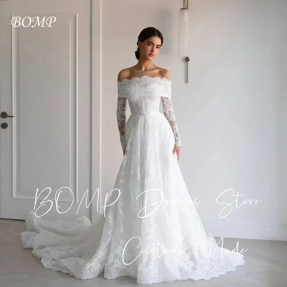 BOMP Robe de mariée élégante en dentelle Cœur Épaules dénudées Manches longues Traîne Ivoire Robe de mariée personnalisée Robe De Mariée