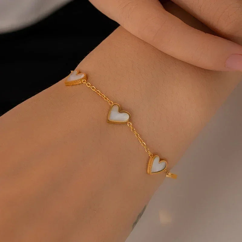 Parure de bijoux en acier inoxydable 316L ANENJERY avec collier, bracelet et boucles d'oreilles en forme de cœur et coquille pour femmes et filles, style simple et tendance, cadeaux en gros