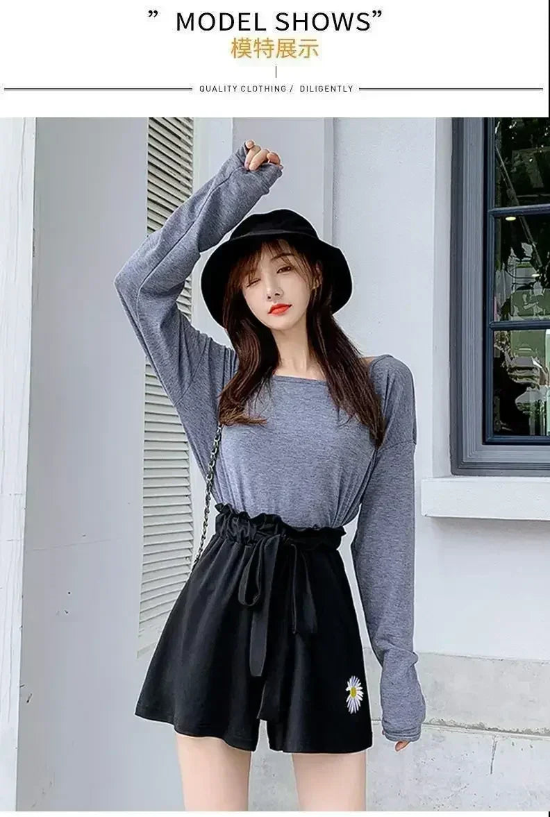 Short décontracté ample à taille haute pour femme, en tissu léger et noir, idéal pour l'été