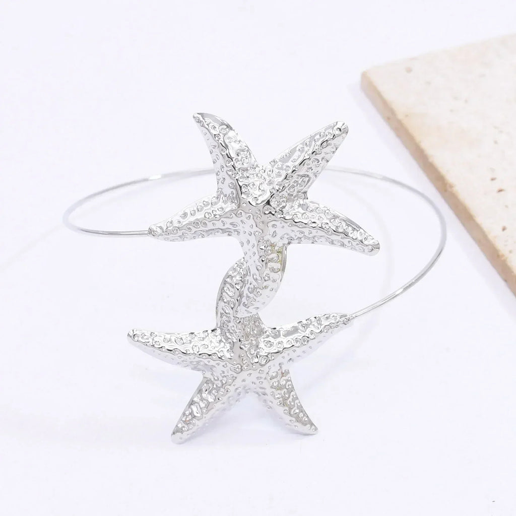 Nouveau bracelet de bras 2 étoiles de mer en alliage doré à la mode pour femmes, idéal pour l'été, la plage, les fêtes dansantes. Manchette, bracelets, accessoires de bijoux, cadeaux