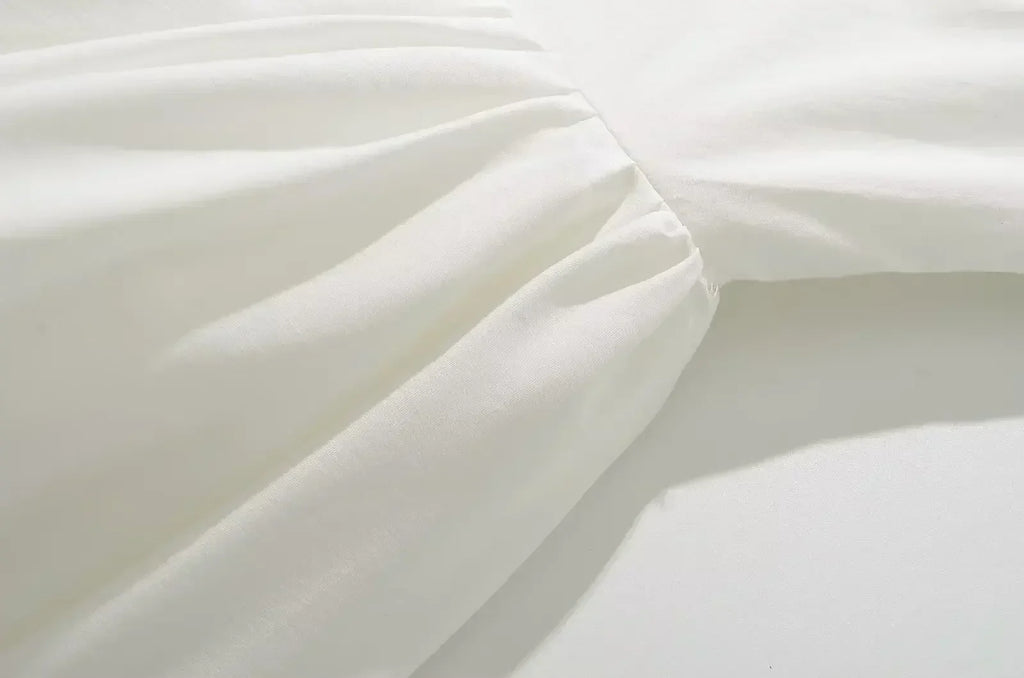 YENKYE Robe d'été blanche courte et évasée pour femme, sexy, à manches courtes, taille basse, élégante, pour soirée, demoiselles d'honneur