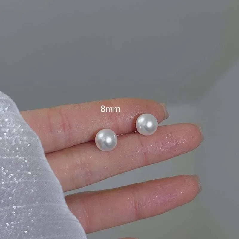 Boucles d'oreilles clous coréennes élégantes en perles blanches brillantes pour femmes, simples et exquises, imitation perles rondes, bijoux de mariage et de fête