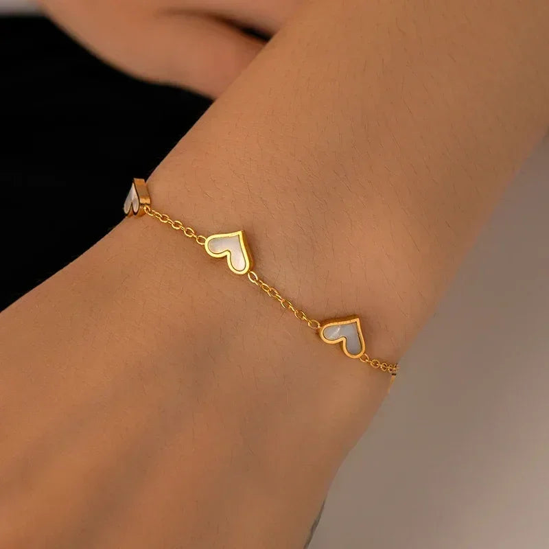 Parure de bijoux en acier inoxydable 316L ANENJERY avec collier, bracelet et boucles d'oreilles en forme de cœur et coquille pour femmes et filles, style simple et tendance, cadeaux en gros