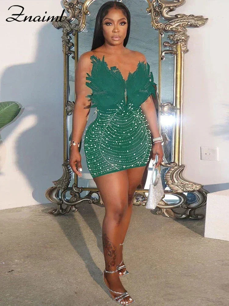 Znaiml Robes moulantes dos nu transparentes en maille diamantée avec strass et plumes sexy pour femme, boîte de nuit, fête d'anniversaire, soirée, Vestidos