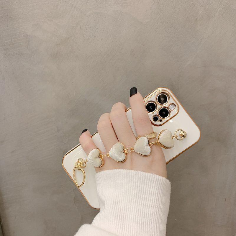 Coque de luxe en silicone pour femme avec bracelet chaîne pour iPhone, coque bracelet pour iPhone 13 12 11 Pro Max, coques avec chaîne en cœur pour iPhone 7 8 Plus XR XS Max X