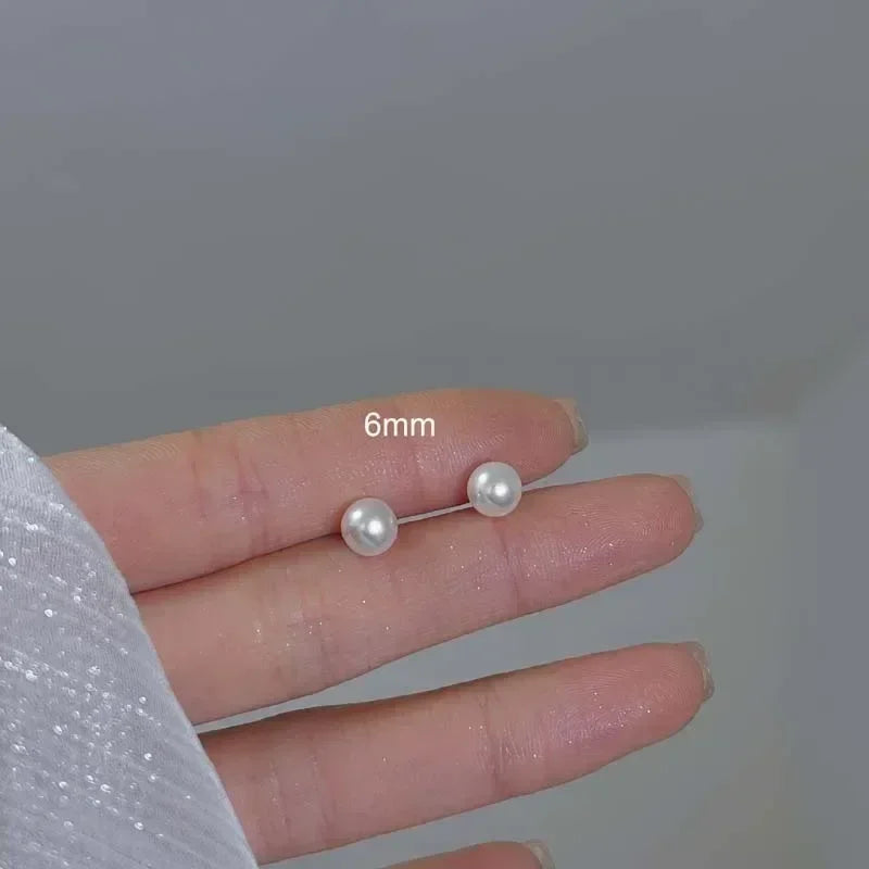 Boucles d'oreilles clous coréennes élégantes en perles blanches brillantes pour femmes, simples et exquises, imitation perles rondes, bijoux de mariage et de fête