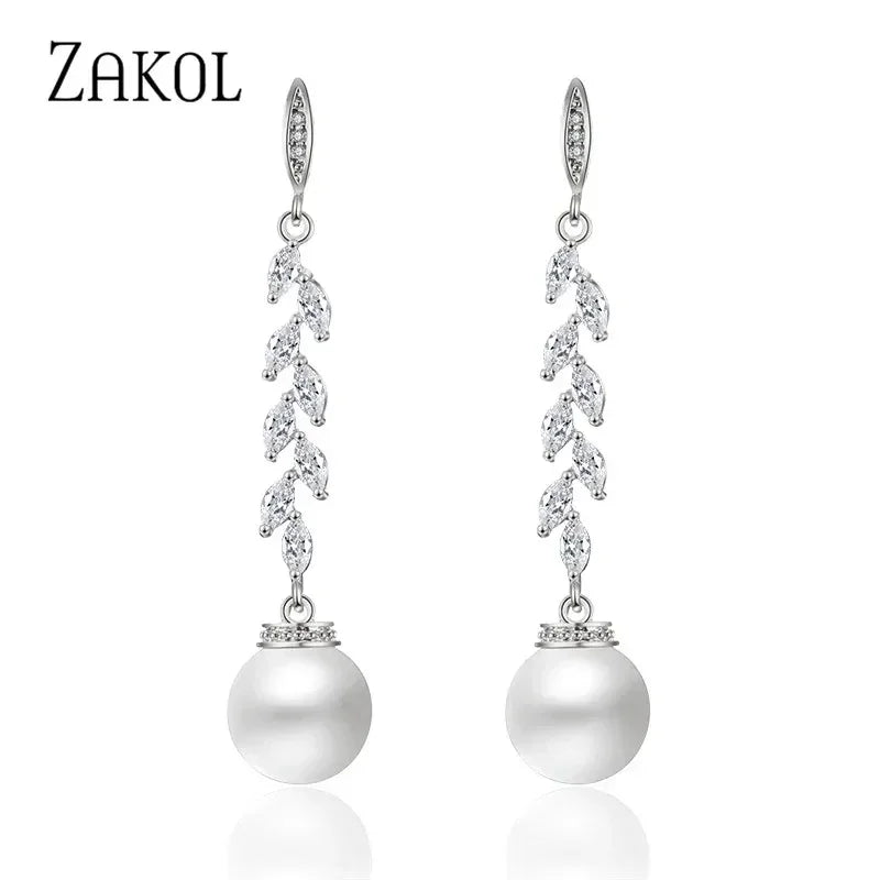 ZAKOL Boucles d'oreilles pendantes rondes imitation perles pour femmes, brillantes, en zircone et cristal, feuilles longues, bijoux de mariée pour mariage