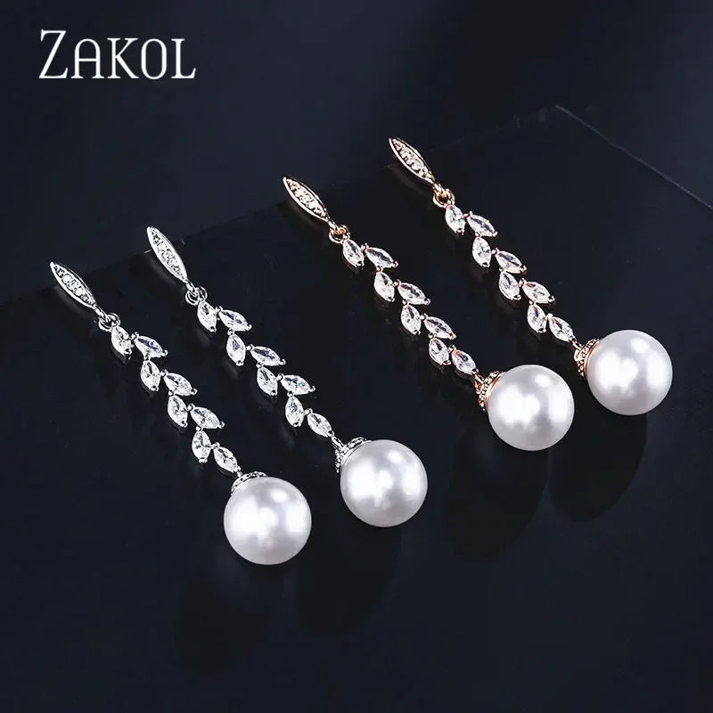 ZAKOL Boucles d'oreilles pendantes rondes imitation perles pour femmes, brillantes, en zircone et cristal, feuilles longues, bijoux de mariée pour mariage