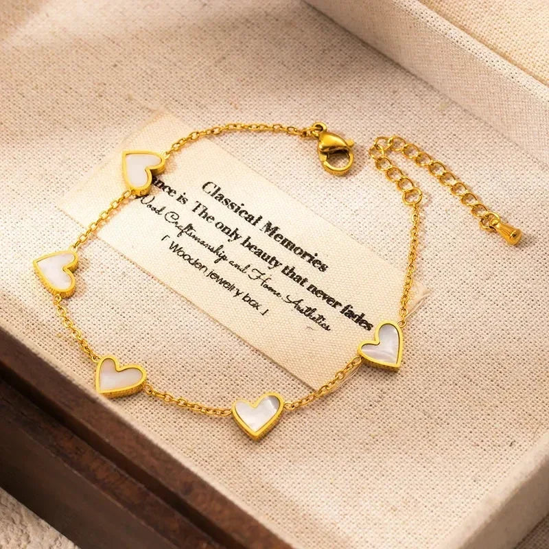 Parure de bijoux en acier inoxydable 316L ANENJERY avec collier, bracelet et boucles d'oreilles en forme de cœur et coquille pour femmes et filles, style simple et tendance, cadeaux en gros