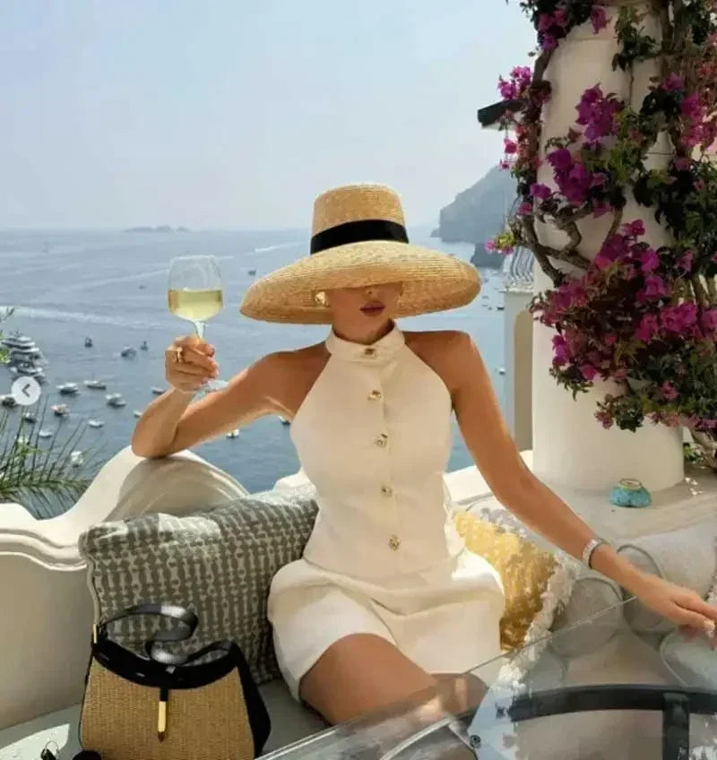Chapeau de paille d'été élégant pour femmes, chapeau de soleil de voyage en bord de mer style Hepburn à large bord