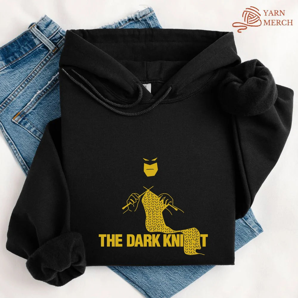 Le sweat à capuche en tricot foncé