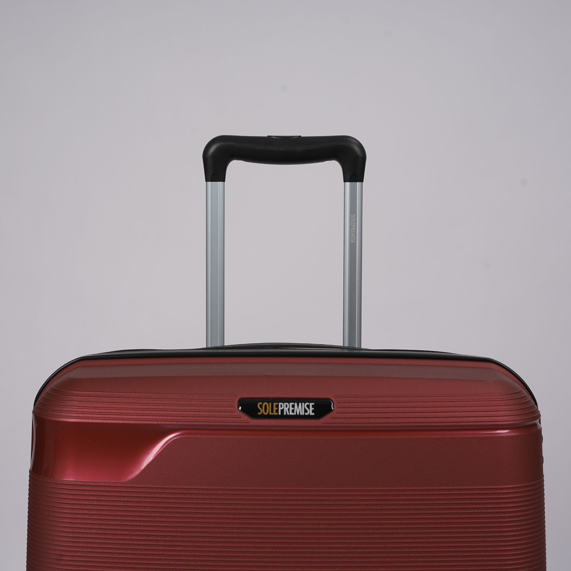 Valise rigide à roulettes rouge de 24 pouces