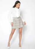 Mini-jupe en tweed rayée rose