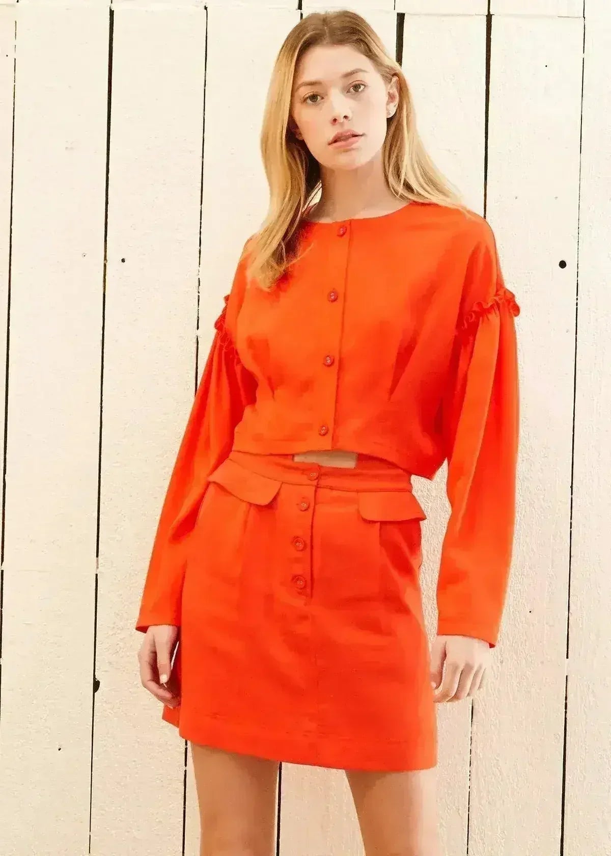 Haut court à manches longues boutonnée pour femme, coloris coquelicot