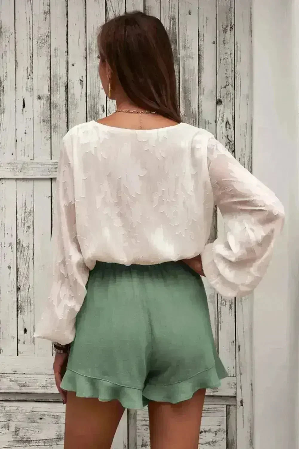Shorts verts en lin et coton à volants pour femme avec poches