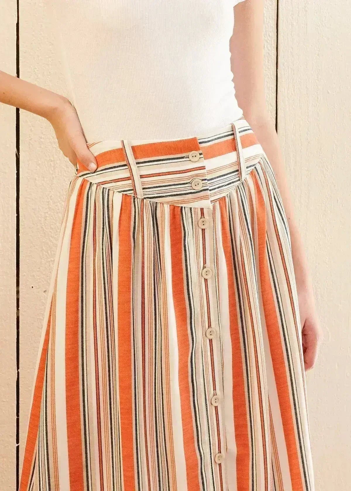 Jupe midi boutonnée à rayures multiples pour femme, coloris rouille multicolore