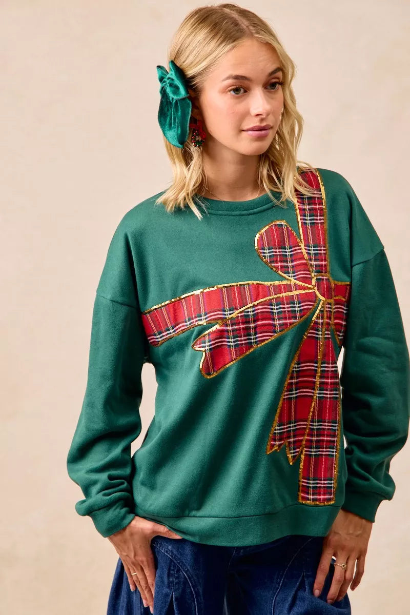 Pull en polaire de Noël BiBi avec nœud en ruban écossais