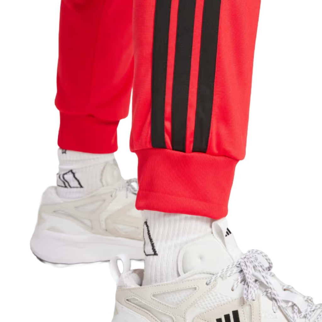 Pantalon de survêtement fuselé classique adidas 3-Stripes en tricot pour homme - Ruby pur