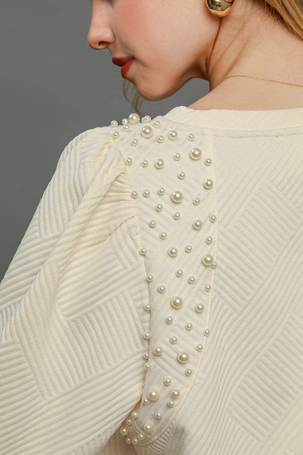 Haut en maille à manches bouffantes couleur crème