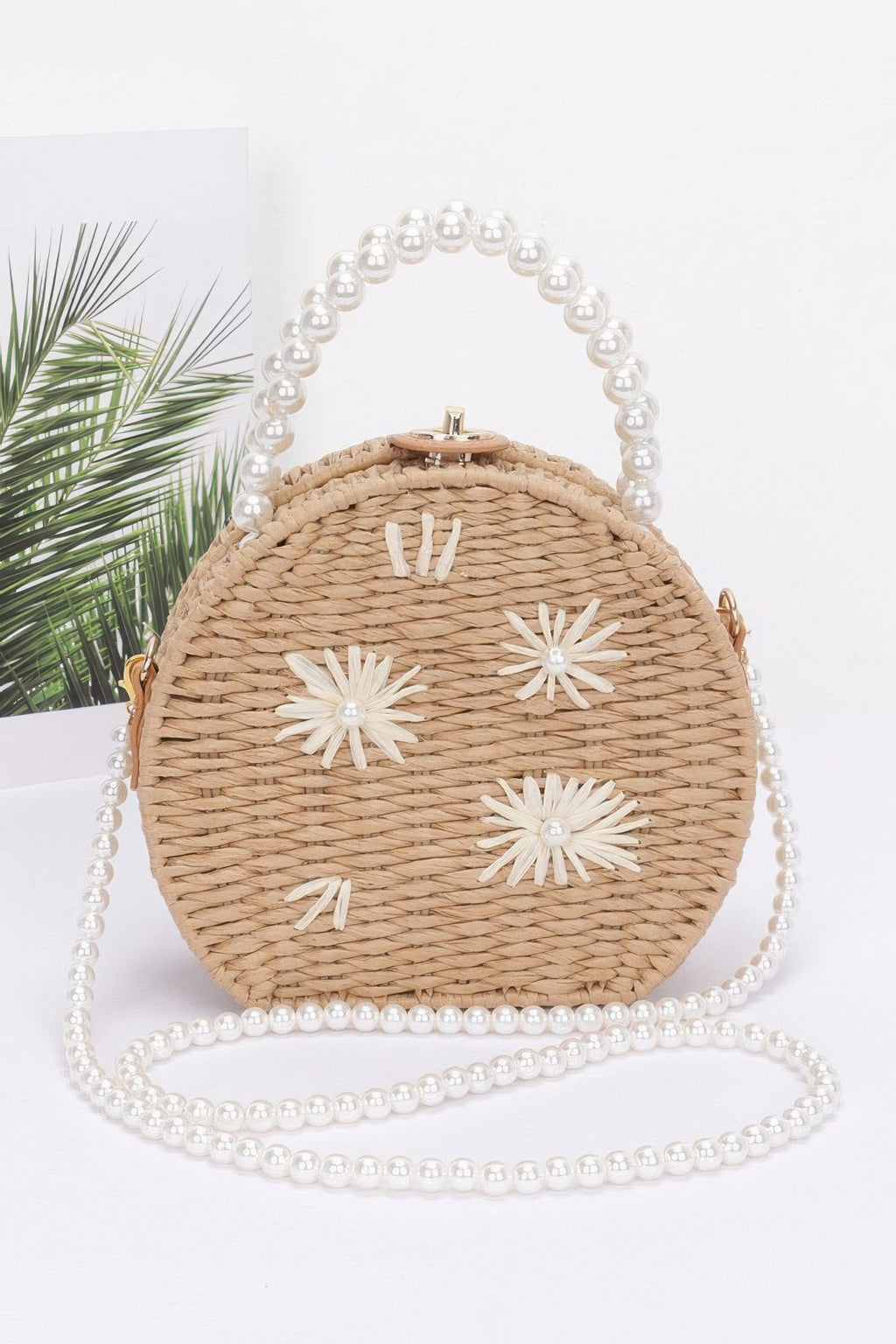 Pochette artisanale imitation paille avec anse perlée