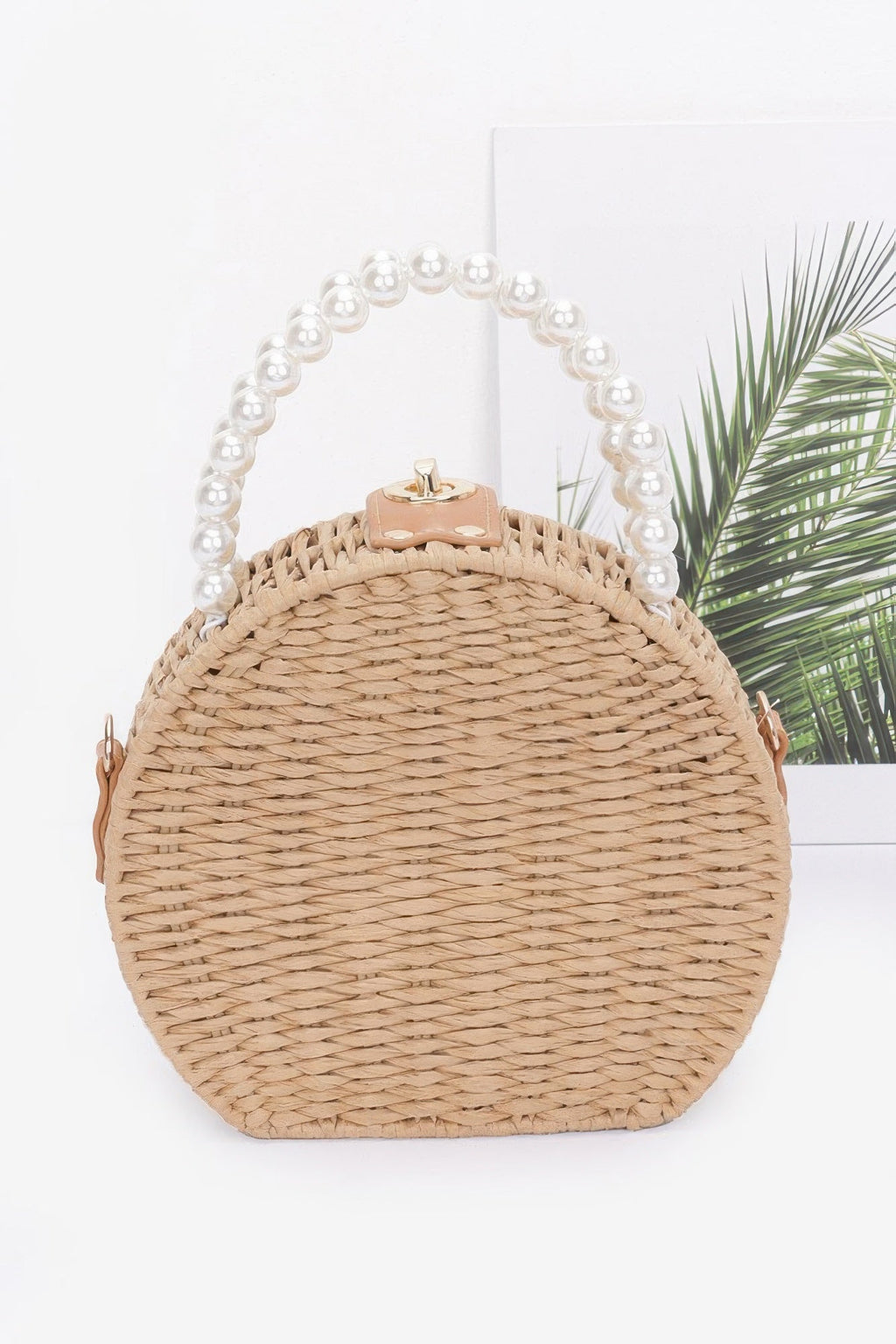 Pochette artisanale imitation paille avec anse perlée