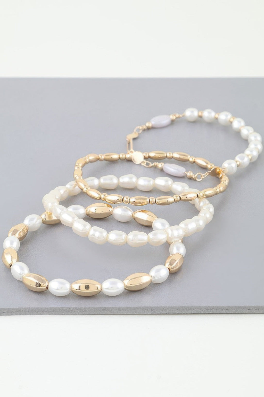 Bracelet en perles de pierre multi-ovales