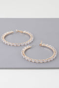 Boucles d'oreilles créoles ornées de larmes