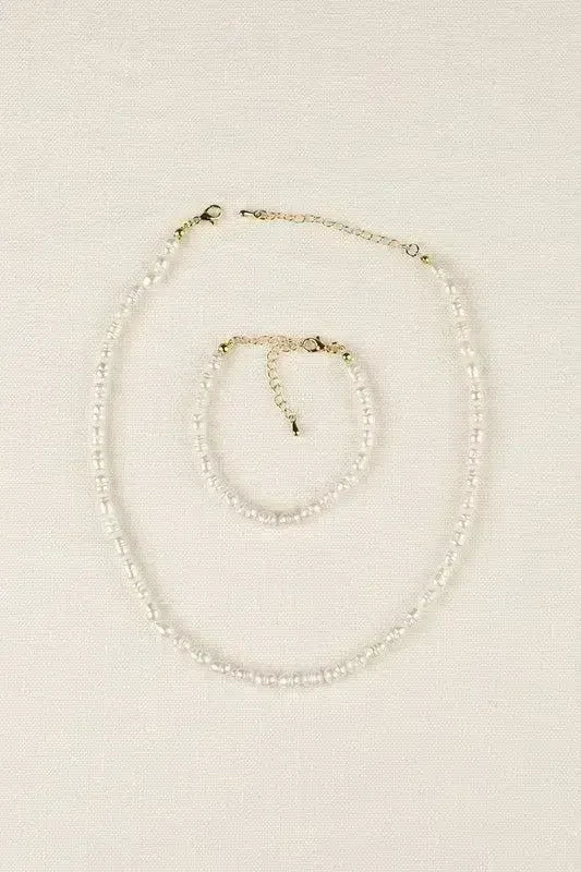 Parure bracelet et collier en perles naturelles de petite taille