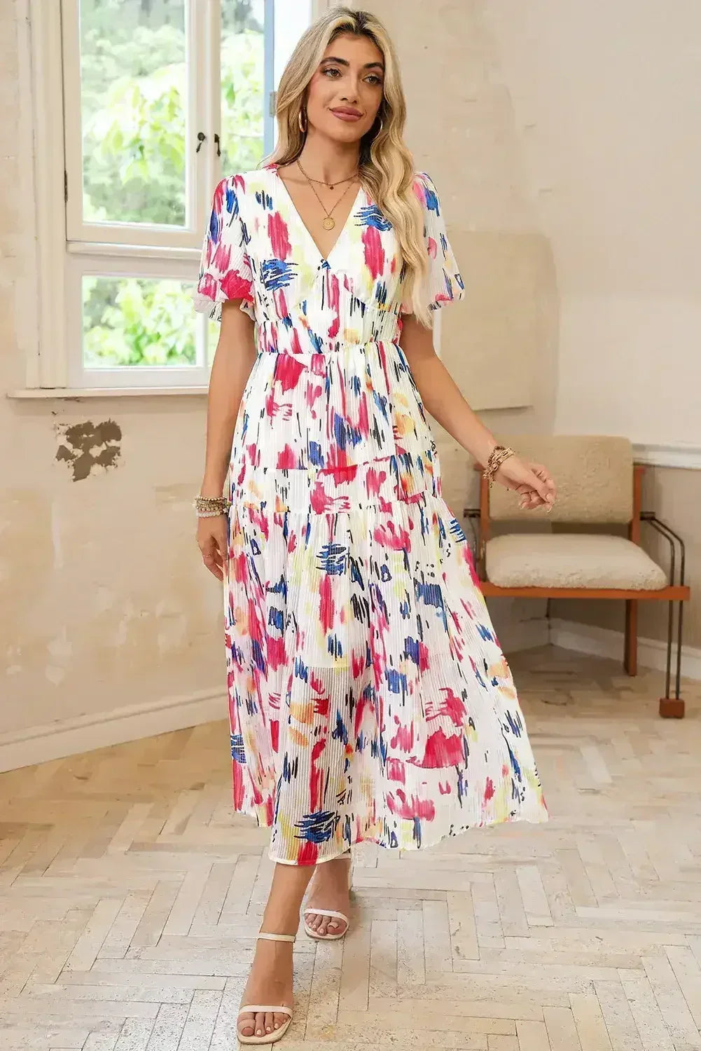 Robe longue étagée à manches courtes bouffantes imprimé abstrait bleu ciel