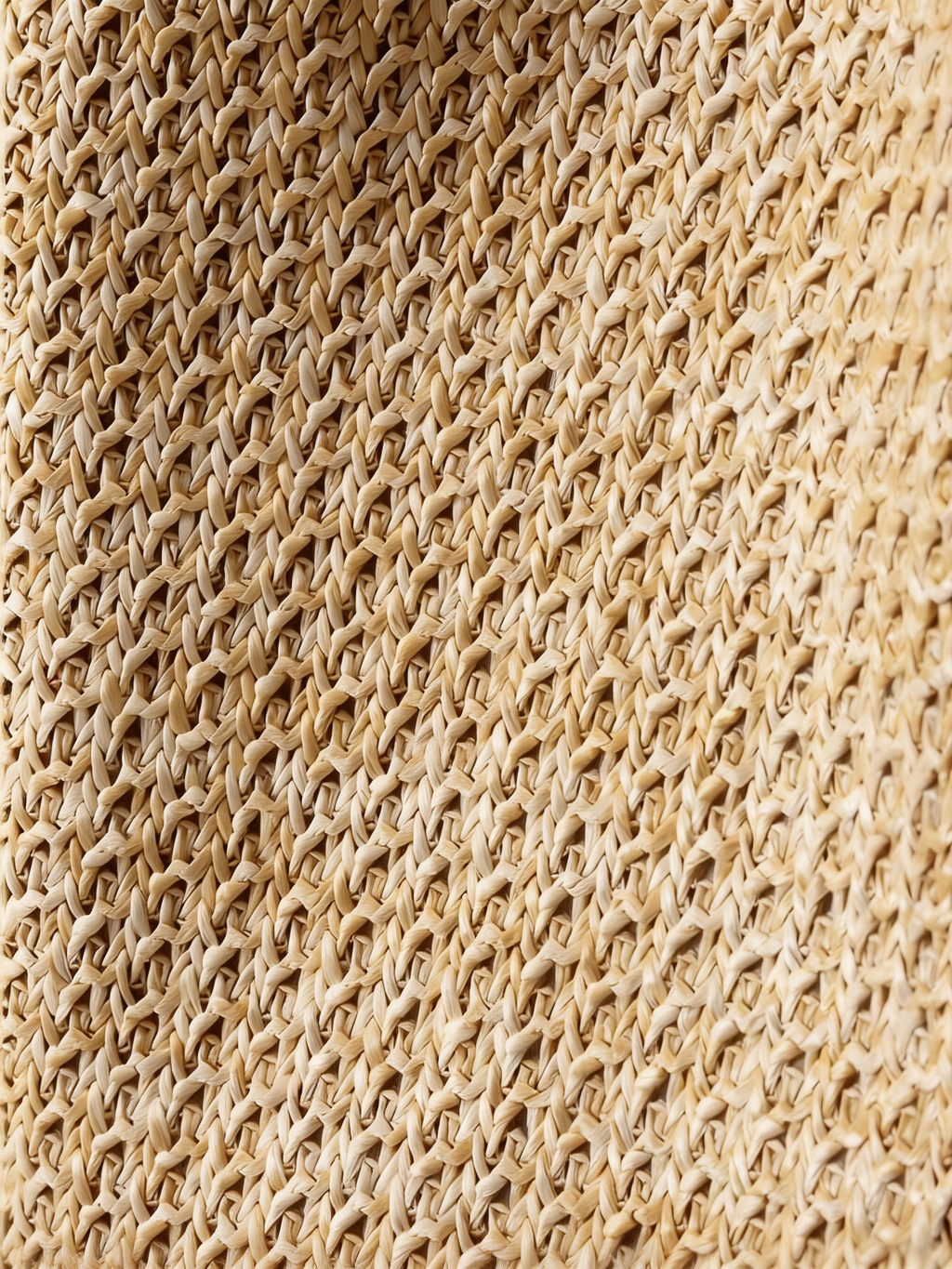 Sac seau artisanal tissé main color block pour un style côtier sans effort