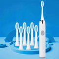 Kit brosse à dents à piles avec 6 brins souples