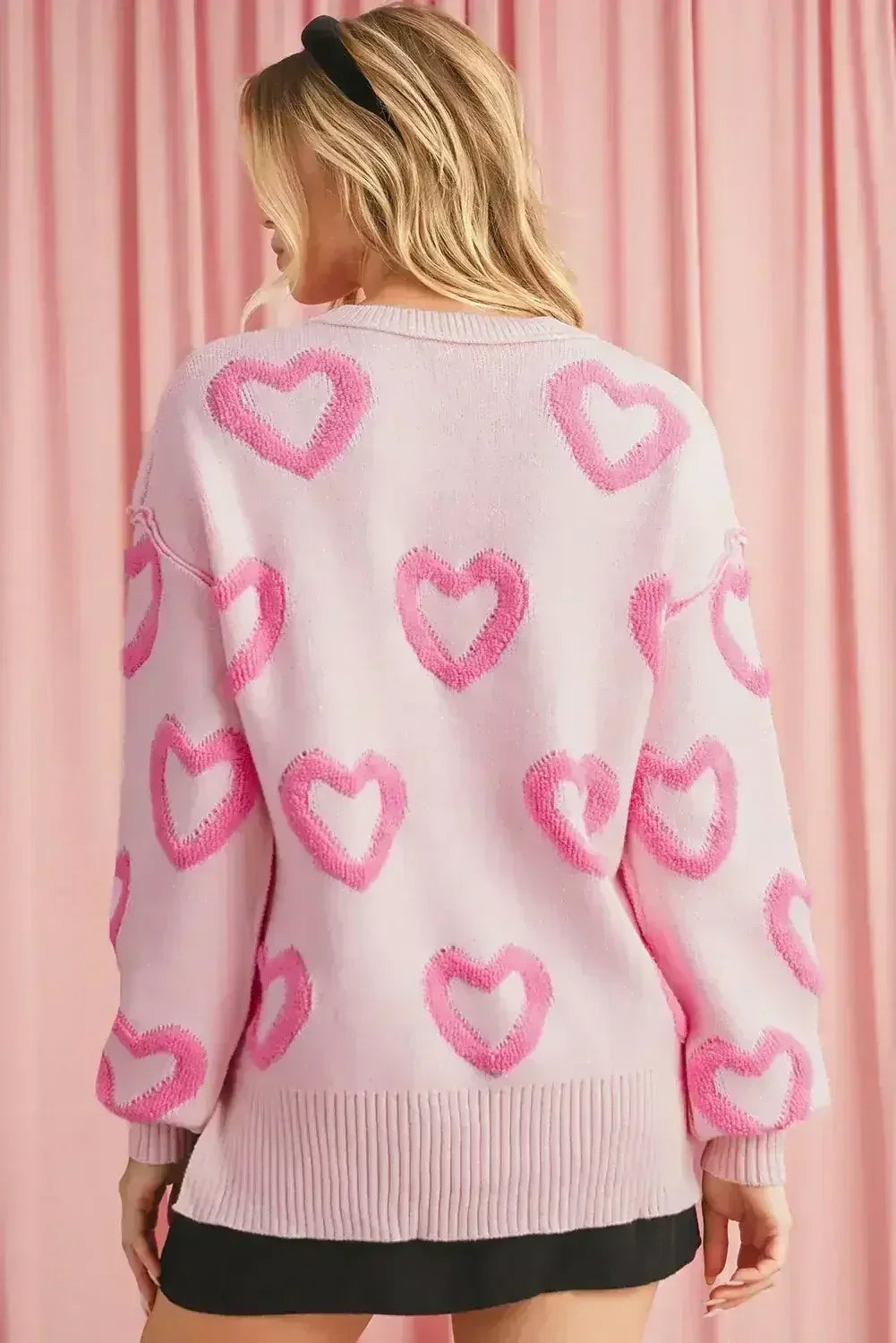 Pull ample en maille à manches bouffantes et cœur rose