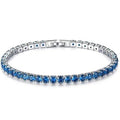 Bracelet tennis en or blanc saphir bleu taille ronde