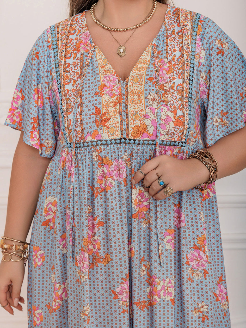 Robe longue à manches flottantes imprimée rose violet taille plus Élégante et fluide Design unique