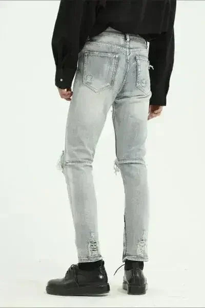 Jean usé avec poches et zip latéral
