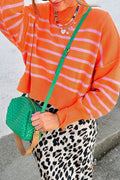 Pull en maille côtelée à rayures orange avec col montant, épaules tombantes et coupe carrée