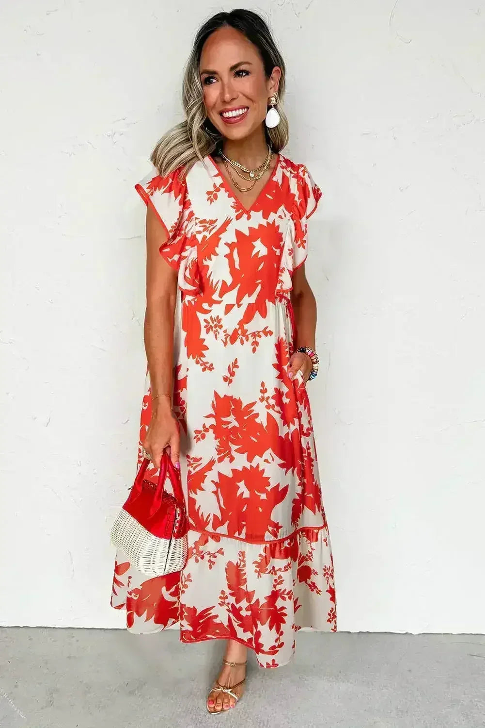 Robe longue rouge à imprimé floral, encolure en V et manches à volants