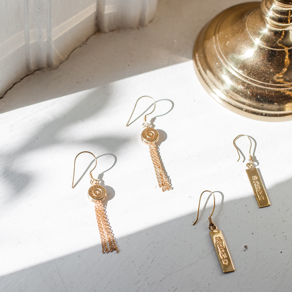 Boucles d'oreilles pendantes à pampilles et balle