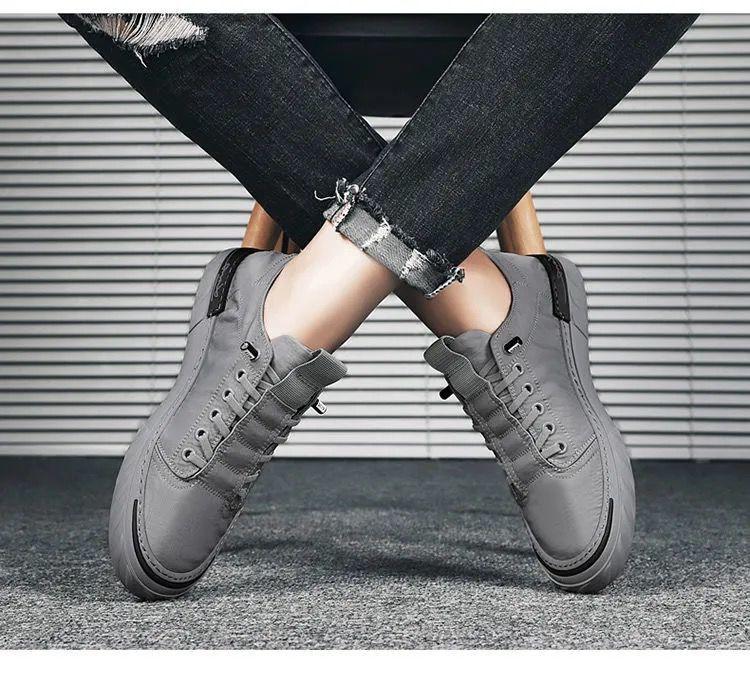 Baskets décontractées en toile pour hommes, confortables et polyvalentes, respirantes, chaussures de sport plates, légères, pour la marche en extérieur, design moderne.