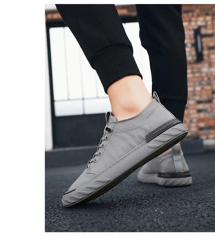 Baskets décontractées en toile pour hommes, confortables et polyvalentes, respirantes, chaussures de sport plates, légères, pour la marche en extérieur, design moderne.